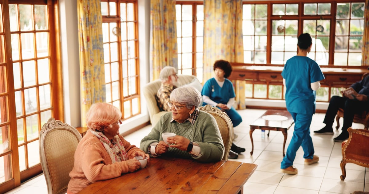 A caring, warm moment between a family member and a loved one at Denver Adult Daycare